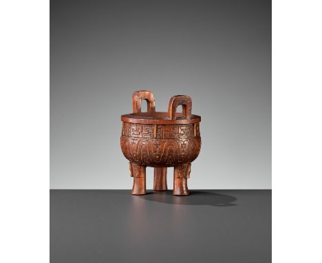 A BAMBOO 'ARCHAISTIC' MINIATURE TRIPOD CENSER, QING DYNASTYChina, 19th century. The globular body supported on three slightly