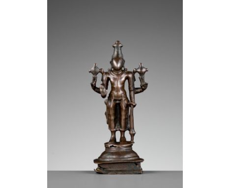 A COPPER ALLOY FIGURE OF VISHNU, PALA PERIODNortheastern India, 10th-11th century. Standing in samabhanga on a circular lotus