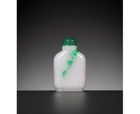 AN EMERALD-GREEN AND WHITE 'PINES IN THE SNOW' JADEITE SNUFF BOTTLE, 1770-1850China. Smoothly polished and well hollowed, the