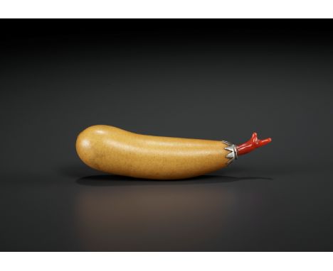 A NATURAL GOURD SNUFF BOTTLE, 18th-19th CENTURYChina. The dried, hollowed gourd finely polished and applied with silver at th