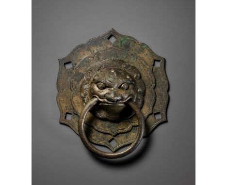 A BRONZE 'LUDUAN' DOOR KNOCKER, MING DYNASTYChina, 1368-1644. Boldly cast with a central luduan head with a fierce expression