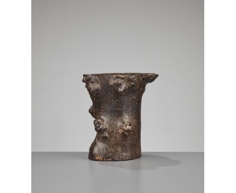 A BURLWOOD 'TREE TRUNK' BRUSH POT, BITONG, QINGChina, 1644-1912. Of attractive form and proportions, the wood with several na