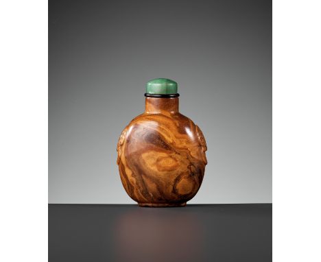A ROOT AMBER SNUFF BOTTLE, 1750-1850China. Of flattened ovoid form, surmounted by a tubular neck with flat lip, the shoulders