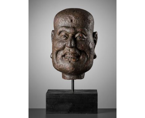 A LARGE DRY-LACQUERED WOOD HEAD OF A LUOHAN, SOUTHERN SONG DYNASTYChina, 1127-1279. Finely modeled, the expressive face with 