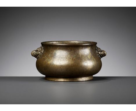 A 'MAKARA' BRONZE CENSER, QING DYNASTYChina, 1644-1912. The compressed globular body rising from a short spreading foot to an