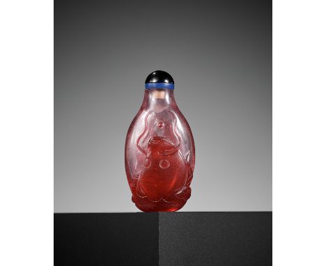 A RUBY-RED OVERLAY GLASS 'CARP' SNUFF BOTTLE, 1760-1840China. Of long oval shape, the transparent overlay in ruby-red carved 