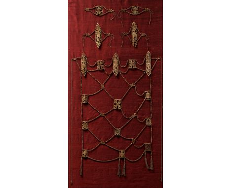 A TIBETAN RITUAL BONE APRON, 18TH-19TH CENTURYComprising five oblong plaques carved with deities in elegant dancing postures 