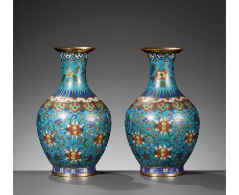 A PAIR OF CLOISONNE VASES, QIANLONG TO JIAQINGChina, 1736-1820. The ovoid body supported on a spreading foot and rising to a 