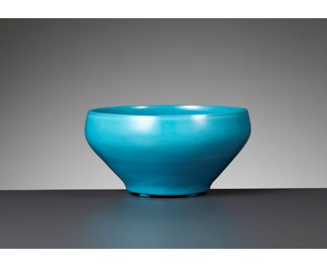 A TURQUOISE GLASS ALMS BOWL, QING DYNASTYChina, 18th-19th century. The vessel with thick walls thinning towards the rim and r