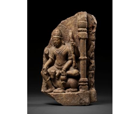 A RED SANDSTONE RELIEF OF SHIVA, 12TH - 13TH CENTURYIndia, Rajasthan or Madhya Pradesh. Finely carved with the four-armed Shi
