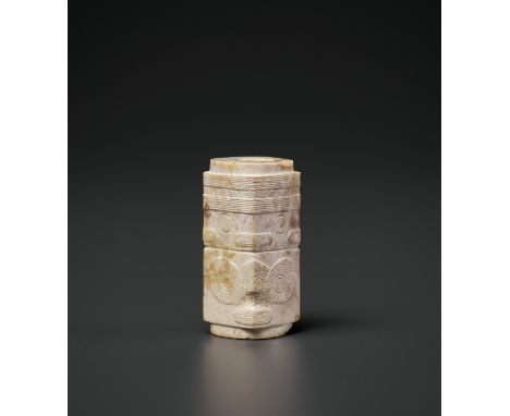 A CONG-FORM ALTERED JADE BEAD, LIANGZHU CULTUREChina, circa 3300-2200 BC. The tubular bead is carved in the form of a two-tie