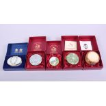 A Halcyon Days enamelled trinket box, commemorating Prince Harry's birth, and four other