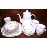 A Roslyn China "Nevis" pattern part teaset and a Wedgwood bone china "Petra" pattern coffee pot
