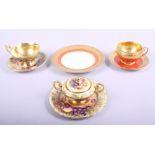An Aynsley bone china cabinet cup, with saucer and side plate decorated fruit, and a matching two-