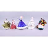 Two Royal Doulton figures, "The Balloon Seller" HN1315, 7 1/4" high, and "Christmas Morn" HN1992, 7"
