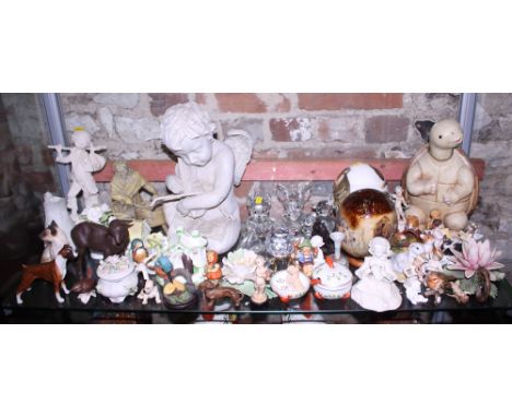 A quantity of Goebel figures and birds, various glass model animals, two decoupage ostrich eggs and other items
