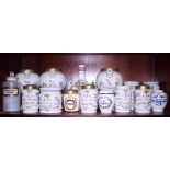 Three "Delft" wet drug jars and a quantity of apothecary’s drug jars