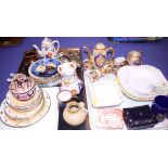 A set of four Shelley soup bowls, enamelled flowers and cottages, a matching tureen base and