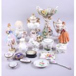 A Metzler and Ortloff figure of a young child, a centrepiece decorated cherubs, various figures,