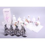 A limited edition Caithness crystal birthday bell, seven assorted ceramic bells and seven silvered