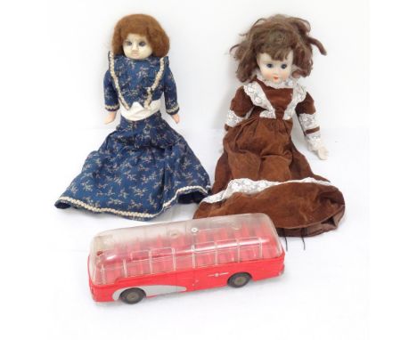 VINTAGE WAX HEAD DOLLwith period dress 41.5cm high, a bisque head doll with dress 45cm high, and a Mettoy single deck bus (3)