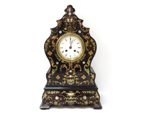 19th CENTURY CONTINENTAL INLAID EBONISED MANTEL CLOCKthe shaped case with mother of pearl and brass inlay, black Roman numera