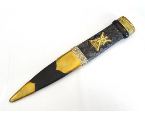 EDWARDIAN SCOTTISH REGIMENTAL SGIAN DUBHwith stone set pommel, raised thistle mounts and St Andrew with cross to ebonised gri