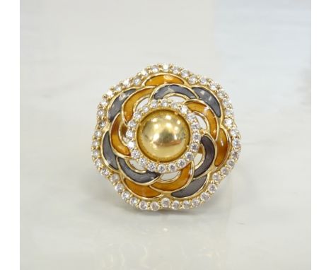 ENAMEL AND CLEAR GEM SET DRESS RINGof flower head design, in eighteen carat gold, ring size Q