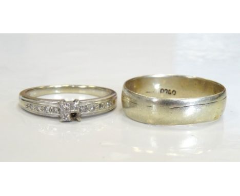 DIAMOND SET RINGon eighteen carat gold shank, ring size M; together with a gold wedding band, ring size N