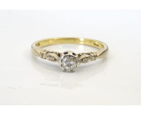 DIAMOND SOLITAIRE RINGthe central round cut diamond approximately 0.15cts, on eighteen carat gold shank, ring size M