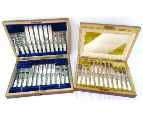 CANTEEN OF SILVER PLATED FISH EATERSwith mother of pearl handles, comprising twelve fish knives and forks with silver collars