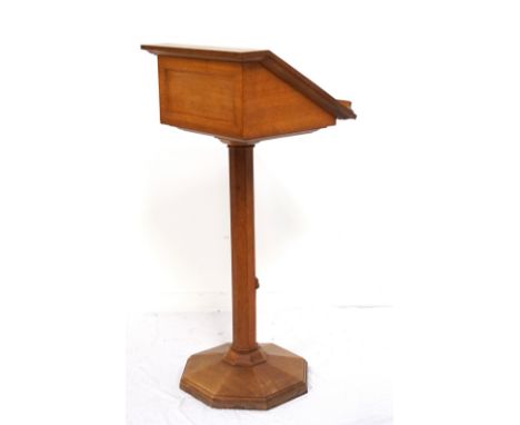 ROBERT 'MOUSEMAN' THOMPSON OAK LECTERNcirca 1930, raised on an octagonal base and column with signature carved mouse, with a 