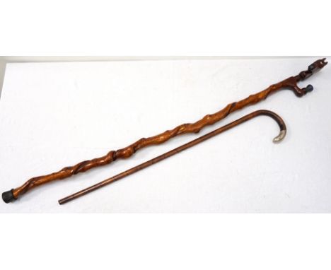 EDWARDIAN SILVER MOUNTED WALKING CANEand a walking staff with horse head and thistle finials, 121cm long (2)