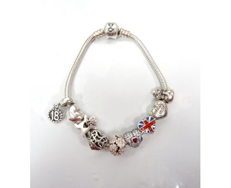 PANDORA MOMENTS SILVER CHARM BRACELETwith nine various charms including a snowman and a gingerbread man