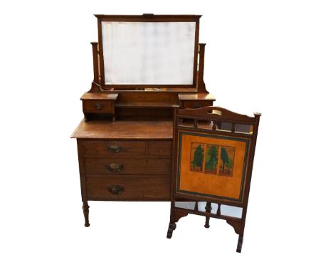 EDWARDIAN OAK MIRROR BACK DRESSING CHESTthe swing mirror with a bevelled plate above two jewellery drawers and an arrangement