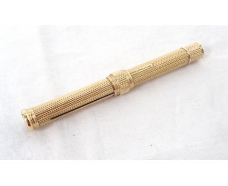 'SAMPSON MORDAN & CO' GOLD PLATED CASED PROPELLING PENCILwith engine turned decoration overall, the body marked 'S.Mordan & C