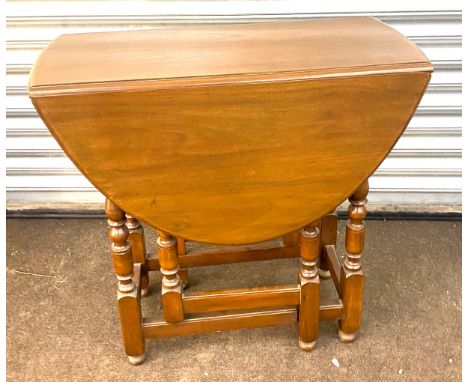 Immaculate oak gate legged drop leaf table measures approx with leaf down 29 inches tall by 30 inches wide and 14 inches deep