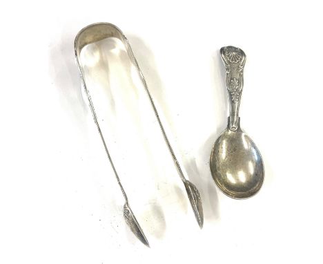 London 1869 Silver tea caddy spoon in Kings patter approximate weight 25.5g, Newcastle 1847 Thomas Sewell Silver sugar tongs 