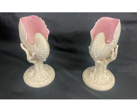 A pair of Royal Worcester nautilus. Rare impressed marks to base. Circa 1876 