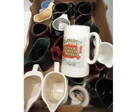 Twenty three branded ceramic whisky advertising water jugs, Glenlivet, VAT 69, Black Bottle, Robbie Dhu etc 