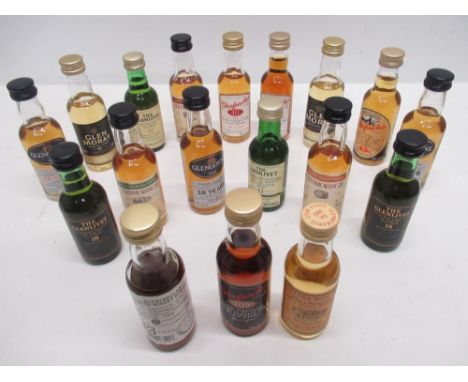 Eighteen miniature single malt Scotch Whiskys to include Glenfarclas 10, 12 and 15 year old, two Glen Moray, two Glenlivet 12