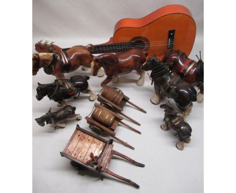 Selection of ceramic dray horses, three dray style wooden carts, child's guitar 