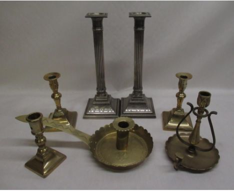 Two silver-plate candlesticks, two brass candlesticks, brass candle holder and two other brass candlesticks (7) 