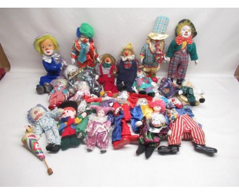 Collection of clown dolls, some with ceramic heads 