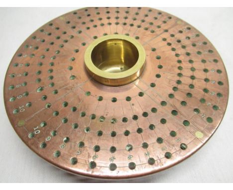 Unusual early C20th copper disc form games marker/cribbage related board, set on four brass feet with central marker cup, pie