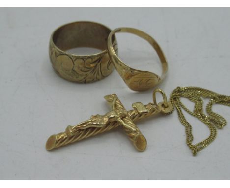 Hallmarked 9ct yellow gold bright cut wedding band size L, another 9ct gold signet ring, size O and a 9ct gold crucifix on ch