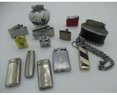 Collection of cigarette lighters and a metal chain 
