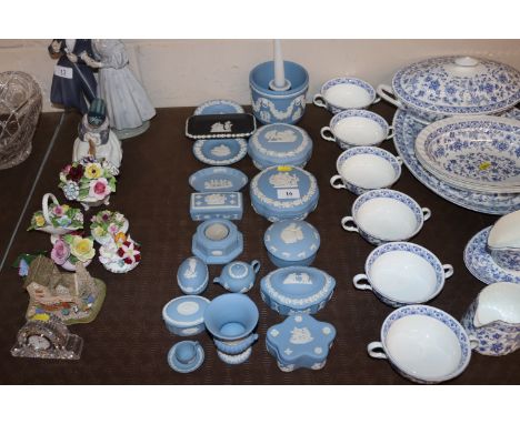 A collection of Wedgwood Jasperware including trinket boxes, miniature teapot, dishes etc.