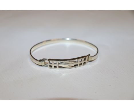 A 1999 hallmarked sterling silver bangle approx. 11.5gms
