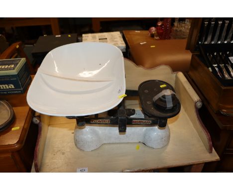 A set of iron and enamel Avery shop scales
